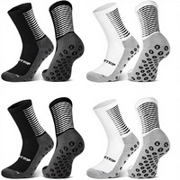 Chaussettes de sport en coton antidérapantes respirantes et rembourrées pour jeunes, idéales pour le football et l'entraînement (ODM)