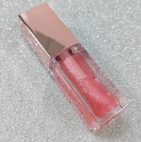 Huile à lèvres hydratante repulpante à marque privée, avec votre logo, tube rose, saveur fraise, végane