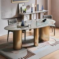 Ensemble de table à manger elliptique de luxe en acier inoxydable et marbre avec chaises, design moderne, utilisation hôtelière, taille personnalisable