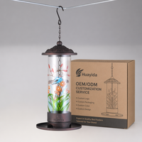 Mangeoire à oiseaux antique en tube transparent peint, motif floral coloré, avec dôme métallique, plateau de base et chaîne de suspension, résistante à la rouille et à l'eau