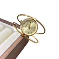 Montre bracelet chic urbaine moderne pour femme, bracelet torsadé tendance, cadran noir champagne, 5 couleurs, style influenceur