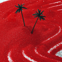 La Color Sand Factory vend du sable de couleur rouge foncé, idéal pour les cérémonies de fondation ou les célébrations d'ouverture.