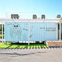 Café Contemporain Modulaire en Conteneur : Design Portable Préfabriqué avec un Style Urbain Tendance pour Espaces Extérieurs