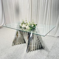 Meubles bon marché pour les événements de mariage, table à manger pour la mariée et le marié en acier inoxydable argenté avec plateau en verre transparent