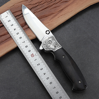 Couteau de poche en acier inoxydable 4CR14 de haute qualité avec tête en acier gravée pour le camping en plein air avec manche en bois d'ébène