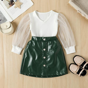 Nouvelle mode, ensemble de vêtements pour filles en 2 pièces, t-shirt en tricot à manches longues en tulle uni + jupe à boutons en PU, ensemble de vêtements pour filles - Product Image 4