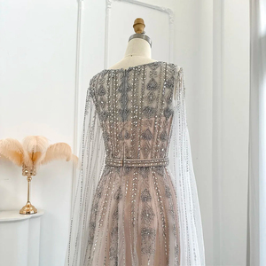 Abito <span class=keywords><strong>da</strong></span> sera in <span class=keywords><strong>argento</strong></span> nudo con maniche a mantello di lusso in cristallo Dubai <span class=keywords><strong>abiti</strong></span> formali per donne Sz069-1 per festa di <span class=keywords><strong>nozze</strong></span> - Product Image 3