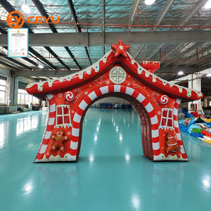 Arche gonflable géante Ceyu en forme de maison de pain d'épices de Noël avec motifs de sucettes et sommet étoilé pour la décoration <span class=keywords><strong>des</strong></span> centres commerciaux en période de fêtes - Product Image 1