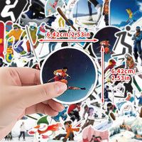 50 autocollants de ski imperméables de marque Fangda Guangxi, autocollants de snowboard en papier couché à motifs de dessins animés, pour bouteille d'eau, ordinateur portable, bagages