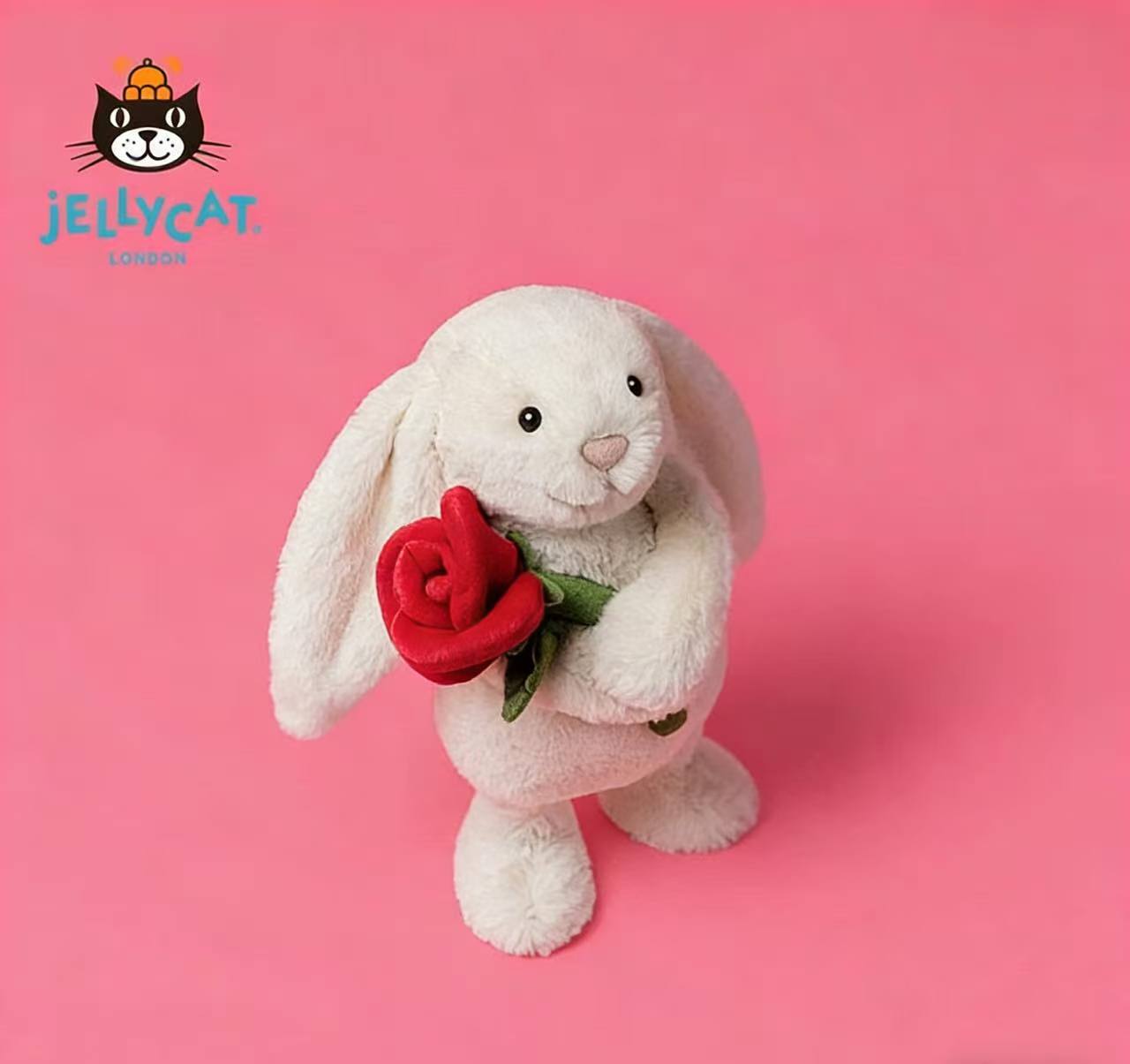 Conejo Bonnie abrazando una rosa, 31 cm.