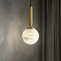 Suspension minimaliste en marbre alabastre veiné mat, globe sphérique de luxe en pierre, luminaire LED suspendu pour hôtel