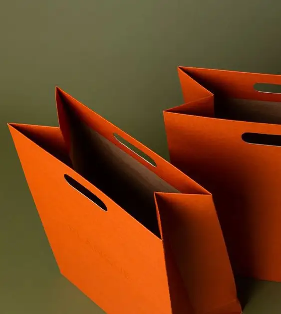 의류 보석 포장을위한 맞춤형 크래프트 종이 포장 가방 비즈니스를위한 손잡이와 고품질 종이 쇼핑 가방