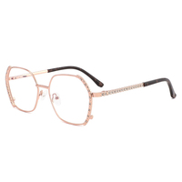 Lunettes élégantes pour femmes avec monture optique en métal papillon, ornements floraux en strass, style chic, écologiques, anti-lumière bleue