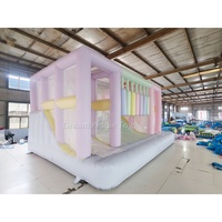 Château gonflable commercial en PVC pastel pour enfants, château sauteur macaron avec toboggan intégré pour location événementielle