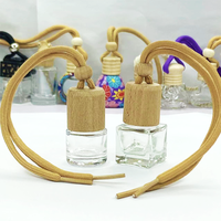 Flacon diffuseur de parfum cylindrique rechargeable en verre transparent 6 ml vide avec couvercle en bois finition mate et bouchon à vis, type hermétique pour voiture