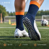 Chaussures de football Field Grip à semelle Chevron, ajustement sécurisé, bleu marine, avec bordure orange continue, profil fin, crampons renforcés, avec tableau des tailles