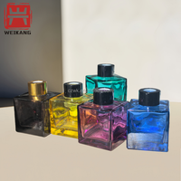 Flacon en verre élégant noir et or à bouton-poussoir, à paroi épaisse, vide, pour sérum, parfum, emballage cosmétique de luxe pour huiles essentielles