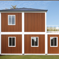 Maison préfabriquée modulaire en conteneur avec structure en acier galvanisé, design moderne imperméable pour bureaux et villas