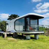 Moducube Maison capsule spatiale mobile de luxe Maison modulaire Maison préfabriquée Tiny Bungalow avec cuisine et salle de bain complètes