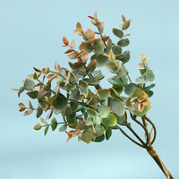 Guirlande de fausses fleurs d'eucalyptus au toucher réel en gros Feuilles artificielles Tiges florales pour Noël Arrangement floral Déco de vacances
