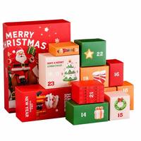 Calendrier de l'Avent Leabon style livre Joyeux Noël, boîte cadeau 24 fenêtres, Père Noël et Bonhomme de neige rouges, en carton, compte à rebours, vente en gros usine