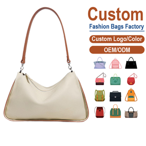 กระเป๋าหนังวัวชั้นบนสุดทรงพระจันทร์เสี้ยว สีครีมขาว ดีไซน์พรีเมียมแบบเฉพาะกลุ่ม สะพายไหล่หรือสะพายข้าง รับผลิตแบบ OEM - Product Image 1