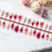 Faux ongles courts à porter, forme amande, effet œil de chat rose-rouge, design papillon 3D, haute qualité, effet éclaircissant, pour le marché international