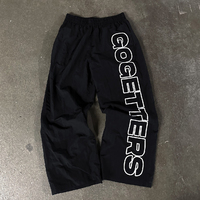 Celana Training Nylon Baggy Longgar Kasual Hitam Polos Pria Kancing Samping Garis Celana Jogger Nylon Polyester Cargo untuk Pria