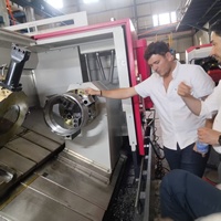 Torno CNC de Cama Inclinada HTC40s con Control FANUC y Husillos Dobles para Fabricación Automotriz, Equipo Médico, Energía, Construcción Naval, etc.
