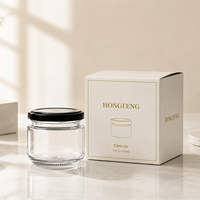 Pot en verre rond transparent personnalisé de 100 ml, 180 ml, 220 ml, 280 ml, 500 ml avec couvercle en métal pour le stockage des aliments, des bonbons, des épices et l'emballage cosmétique