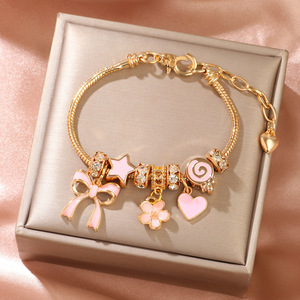 Bracelet à breloques tendance pour enfants, motif cœur rose, étoile, nœud, bonbon, bijoux cadeau, en alliage de zinc, serti clos, origine Yiwu - Product Image 1