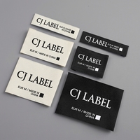Étiquette de vêtement personnalisée en coton sergé imprimé et gaufré avec logo de marque pour vêtements, t-shirts et jeans