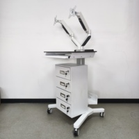 Chariot médical moderne en aluminium réglable en hauteur pour double moniteur, avec 4 tiroirs et verrouillage central, pour usage hospitalier