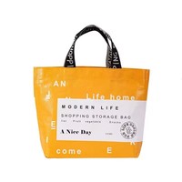 Sac de voyage pliable en polypropylène tissé sur mesure, style minimaliste moderne, grande capacité, imperméable, résistant à l'humidité, avec fermeture éclair