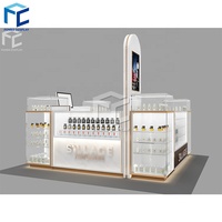 Kiosque de présentation de parfums moderne pour centre commercial, kiosque de vente au détail d'arômes, kiosque de présentation de parfums personnalisé avec éclairage LED, design en bois
