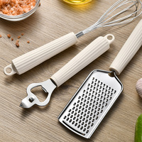 Ensemble d'ustensiles de cuisine en acier inoxydable avec logo personnalisé, poignée blanche, comprenant éplucheur, ouvre-boîte, coupe-pizza et plus encore
