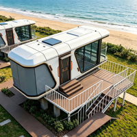 Maison mobile isolée et résistante aux intempéries, type capsule spatiale préfabriquée sur roues, structure en A, pour glamping, petite maison mobile, livraison directe d'usine