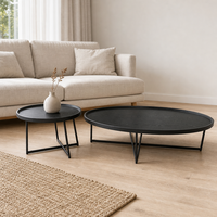 Ensemble de tables basses ovales modernes noires avec plateau en bois grainé et pieds en métal pour salon