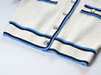 Nouvel ensemble 2 pièces pour femme style preppy été 2026 : pull tricoté à col revers de haute qualité et mini-jupe douce