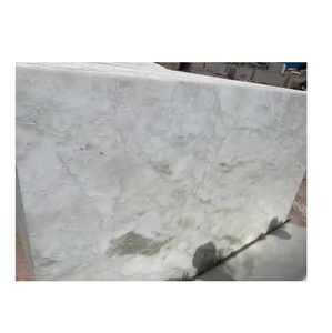 แผ่นหินอ่อนโอนิกซ์สีขาวหินธรรมชาติที่สง่างามสำหรับปูผนังและปูพื้นในโครงการที่พักอาศัย - Product Image 1