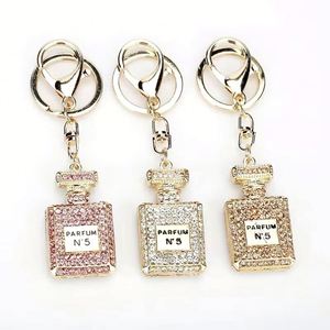 Porte-clés de luxe en alliage métallique avec pendentif en cristal brillant, boussole émaillée personnalisée pour breloque de sac femme, idéal pour l'art et l'artisanat - Product Image 6