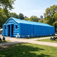 Tente d'exposition gonflable en PVC avec un grand toit arqué et un intérieur spacieux pour les salons professionnels, les événements de marque et les festivals