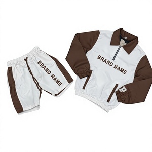 Ensemble de survêtement sportif personnalisé pour enfants, orange et blanc, avec veste demi-zip et short, séchage rapide, coupe classique, idéal pour le printemps - Product Image 6