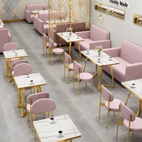 Ensemble de mobilier commercial moderne pour restaurant, café et salon de thé, avec banquette et chaise rose