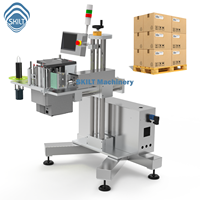 Étiqueteuse automatique en ligne Skilt pour cartons, palettes et plateaux avec impression de codes-barres, codes QR et intégration ERP