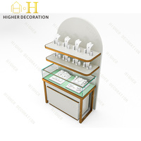 Comptoir de caisse mural personnalisé blanc pour kiosque à bijoux, vitrine de présentation pour bijouterie et horlogerie, design de magasin de bijoux