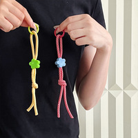 Cordon de poignet tressé décoratif étoile fleurie à bas prix, portable, anti-perte pour clés et téléphone, vente en gros