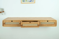 Table console flottante avec trois tiroirs en rotin en chêne massif