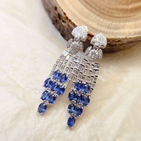 Boucles d'oreilles pendantes populaires en saphir bleu naturel, en argent sterling S925 avec sertissage raffiné et style accrocheur, idéales pour les cadeaux