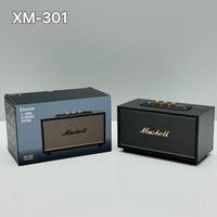 Nouveau haut-parleur portable d'extérieur en bois XM301 Retro 5.0 avec subwoofer 10W, radio FM intégrée et batterie, design compact